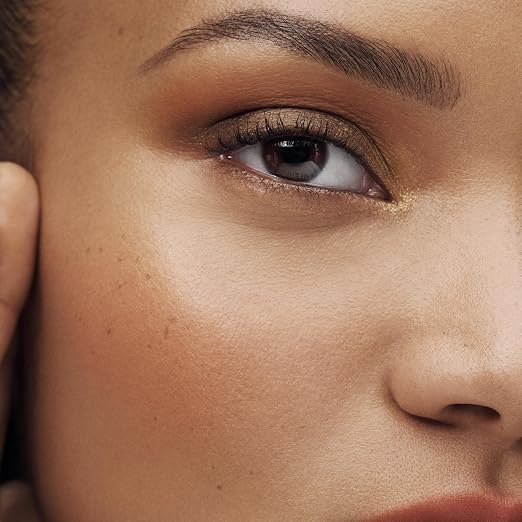 Eccentric Amber - A sun-kissed golden brown with warm undertones
